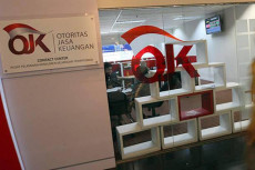 OJK Resmi Cabut Izin...