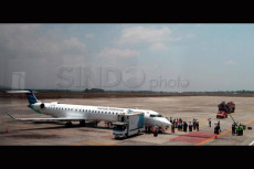 Garuda Tutup Sebagian...