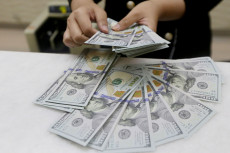 Nilai Tukar Rupiah Terhadap...