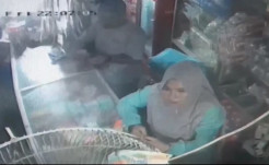 Pasutri Tanjung Balai Terekam CCTV Membuang Sabu-sabu di Toko Grosir