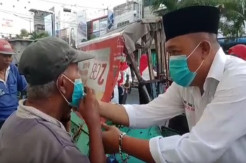 Perindo Asahan Berbagi Takjil Makanan Berbuka Puasa dan Masker Cegah COVID-19