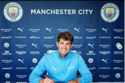 Guardiola, Alasan Stones Bertahan di Man City