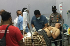 Bripka Mufiza anggota Polsek Lhoksukon Terkapar Diserang Pelaku Pembacok Warga saat Datangi TKP