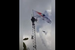 Militansi Kader Perindo Madiun, Pasang Bendera di Atas Tower Berketinggian Puluhan Meter
