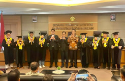 Staf Khusus Menteri Hukum Yadi Hendriana Raih Gelar Doktor Ilmu Komunikasi