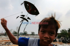 Anak-Anak Jakarta Manfaatkan Tanah Kosong untuk Bermain