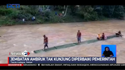 Warga Tasikmalaya Nekat Gunakan Rakit Sebrangi Sungai Berarus Deras