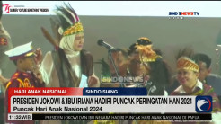 Presiden Jokowi Pakai Topi Rumbai Papua di Puncak Hari Anak Nasional