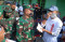 TNI Serahkan Ganti Rugi...