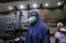 Dibalut Kerudung Biru,...