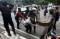 Polisi dan TNI Bubarkan...