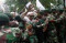 Polisi dan TNI Bubarkan...