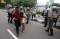 Polisi dan TNI Bubarkan...