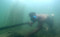 Pemanah Ikan di Danau...