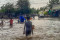 Banjir Kepung Ruas Jalan...