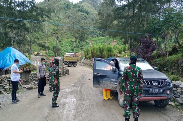 Malintasi Tolikara Papua, Kendaraan Wajib Disemprot Disinfektan