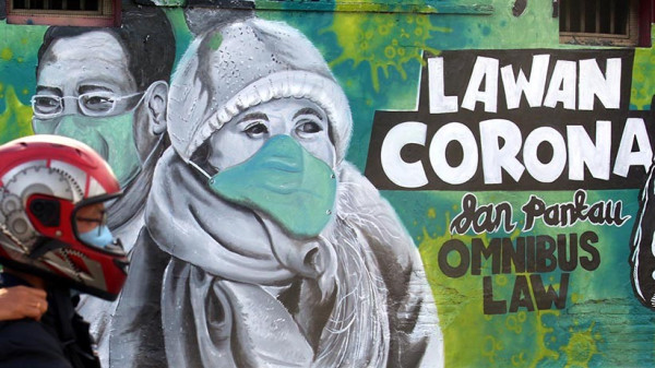 Solidaritas Hadapi Virus Corona, Para Seniman Sampaikan Pesan lewat Grafiti