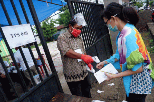 Penerapan Protokol Kesehatan di TPS Pilwalkot Makassar