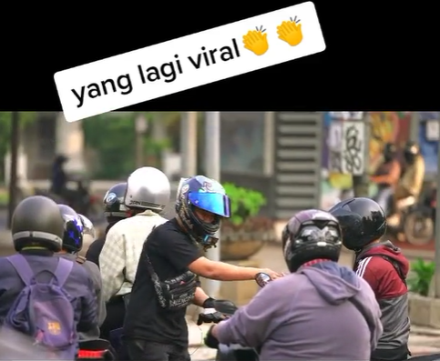 Viral Video Pemotor Bagi-Bagi Uang Jutaan Rupiah di Lampu Merah
