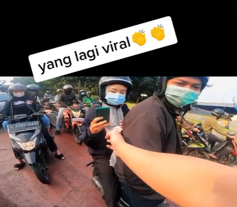 Viral Video Pemotor Bagi-Bagi Uang Jutaan Rupiah di Lampu Merah