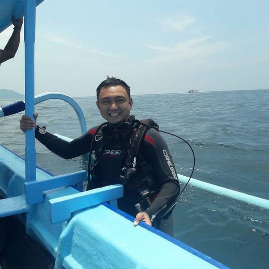 Agustian Syach, Kasatpol PP Kota Bogor Bagi-bagi Sembako Ternyata Punya Hobi Diving dan Bersepeda