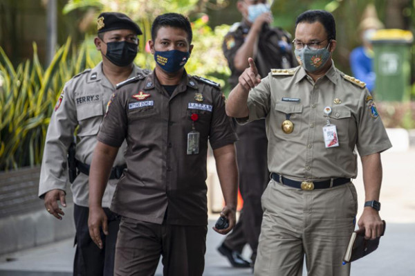Beda Gaya Ahok dan Anies ketika Dipanggil KPK