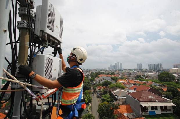 XL Axiata Jual Aset...