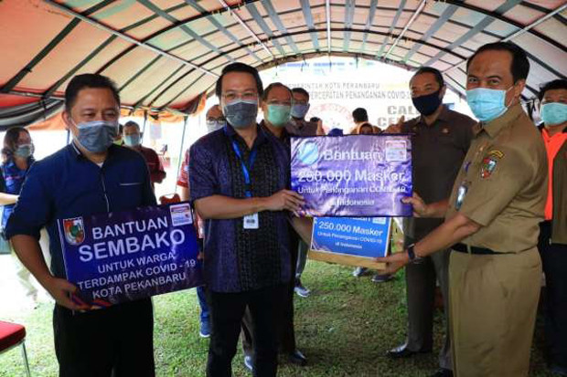 Indomaret Serahkan Bantuan...