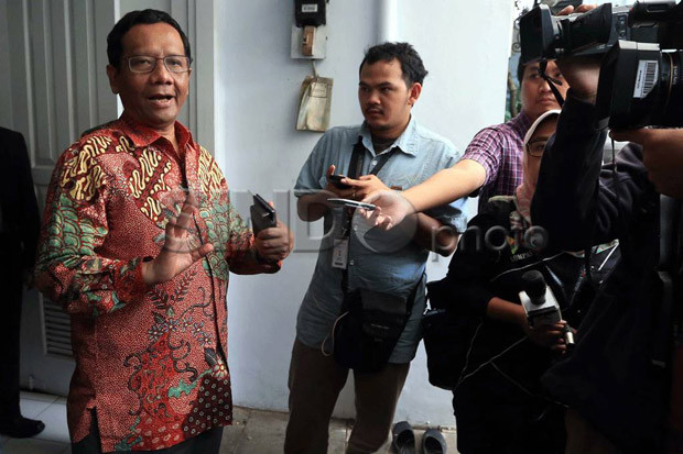 Mahfud MD: Menjalankan...