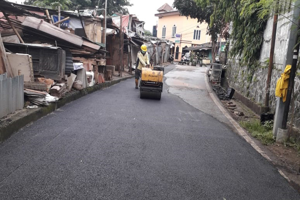Jalan Retak Akibat Tergerus...