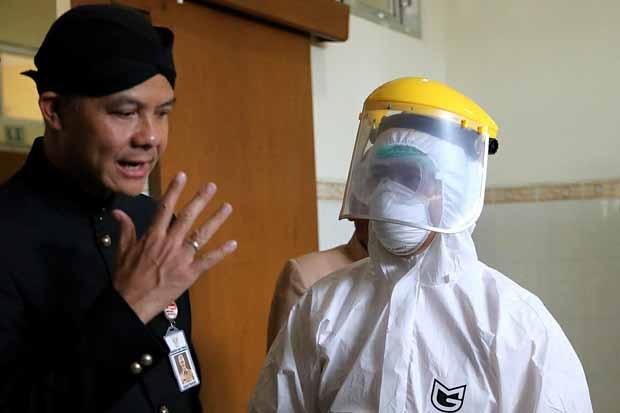 Positif Corona, 13 Tenaga...