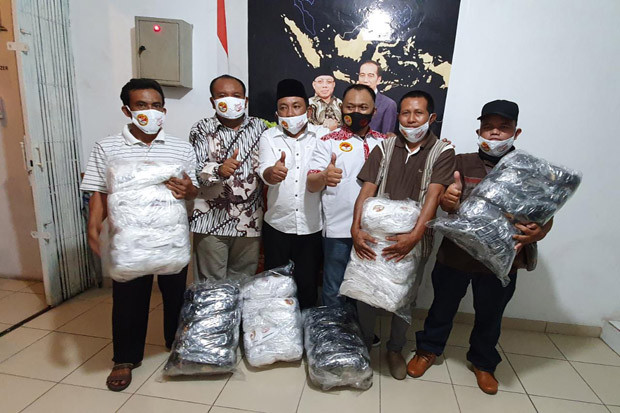 Donasikan Ribuan Masker...