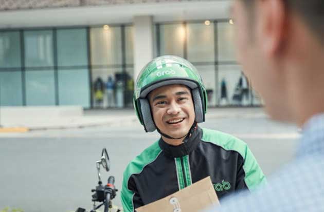 Grab Gandeng OTO Group...