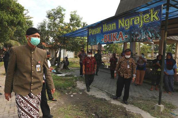 Ratakan Pembangunan,...