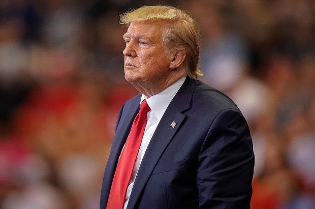 Cuomo: Trump Harus Bawa...