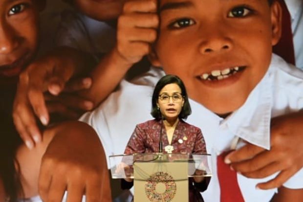 Sri Mulyani, IMF dan...