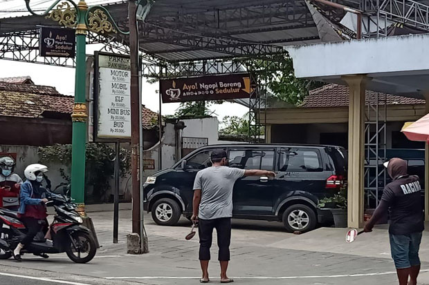 Melihat Wisata Kampung...