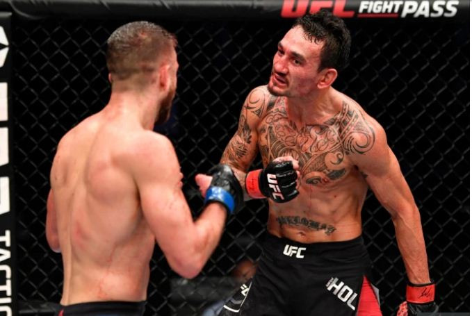 Dustin Poirier Mundur,...