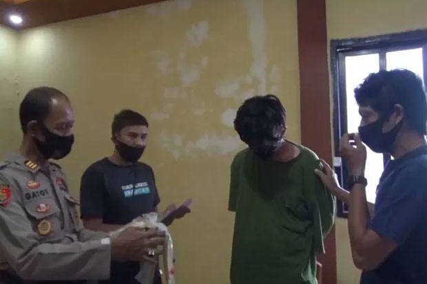 Polisi Tangkap Pemuda...