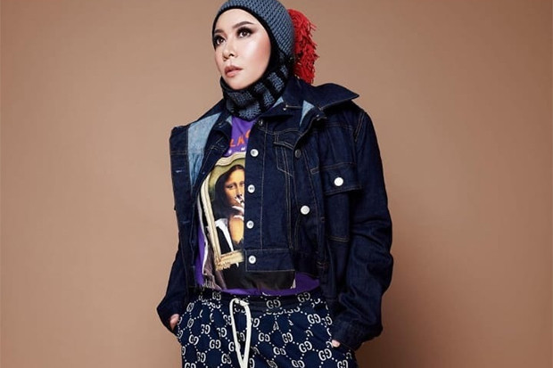 Potret Melly Goeslaw...