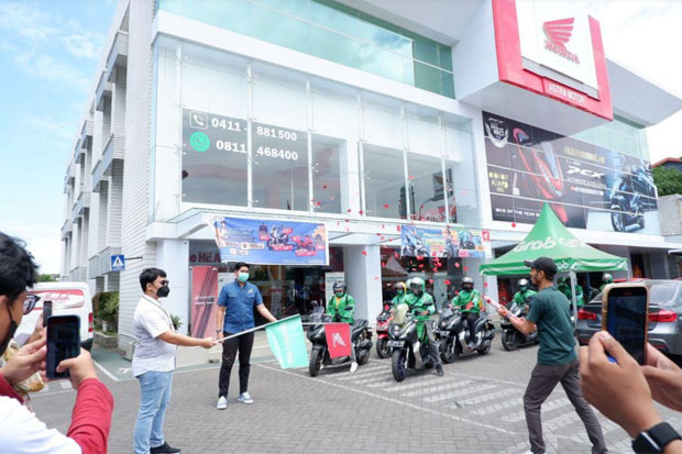 Grab dan Astra Motor...