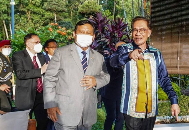 Berkunjung ke Malaysia,...