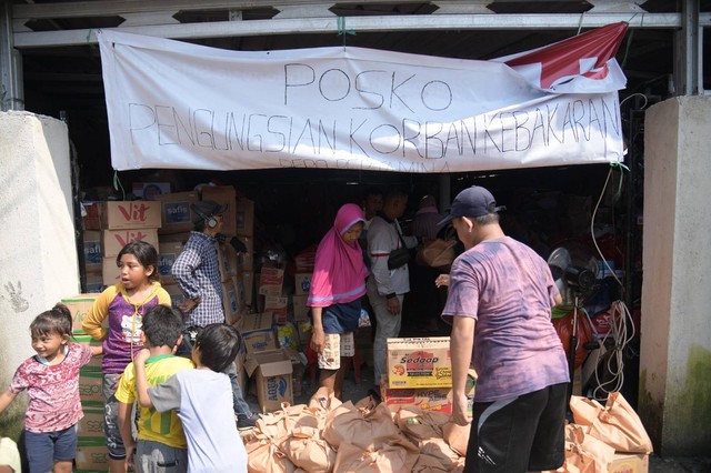 Membantu Meringankan...