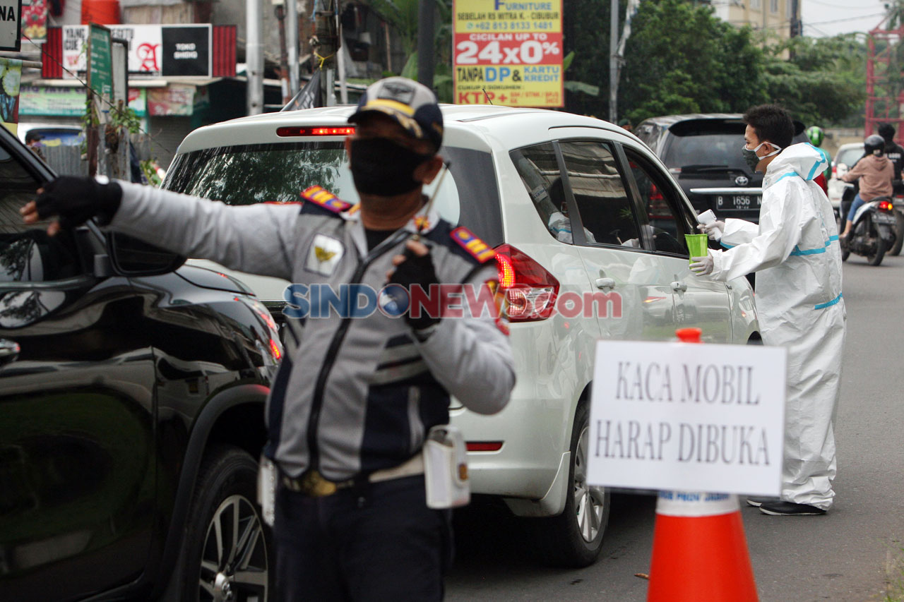 Petugas Gabungan Lakukan...
