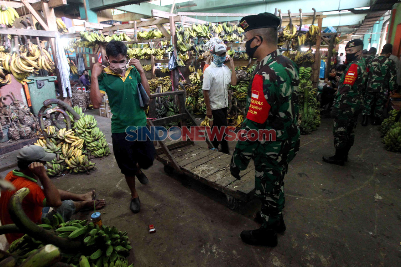 Pedagang Pasar Induk...