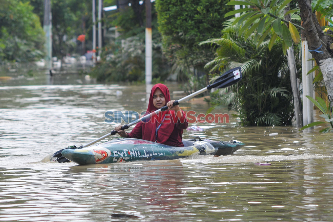 Luapan Kali Cikeas,...