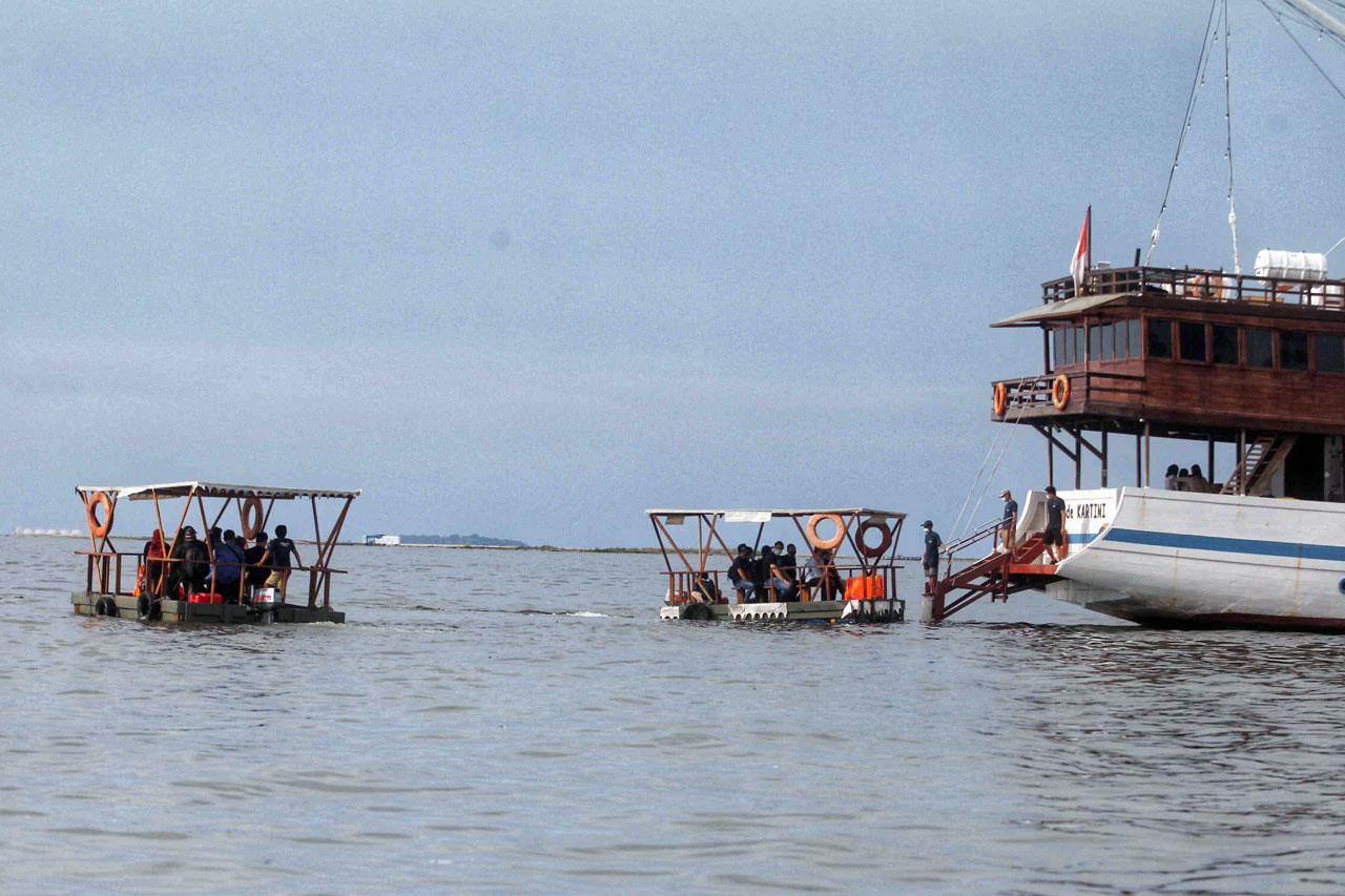 Asiknya Berwisata dengan...