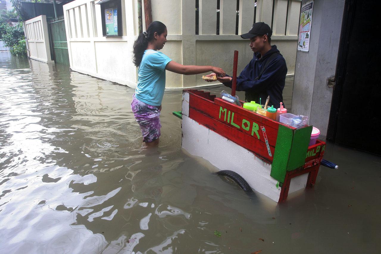 Banjir Kepung Permukiman...
