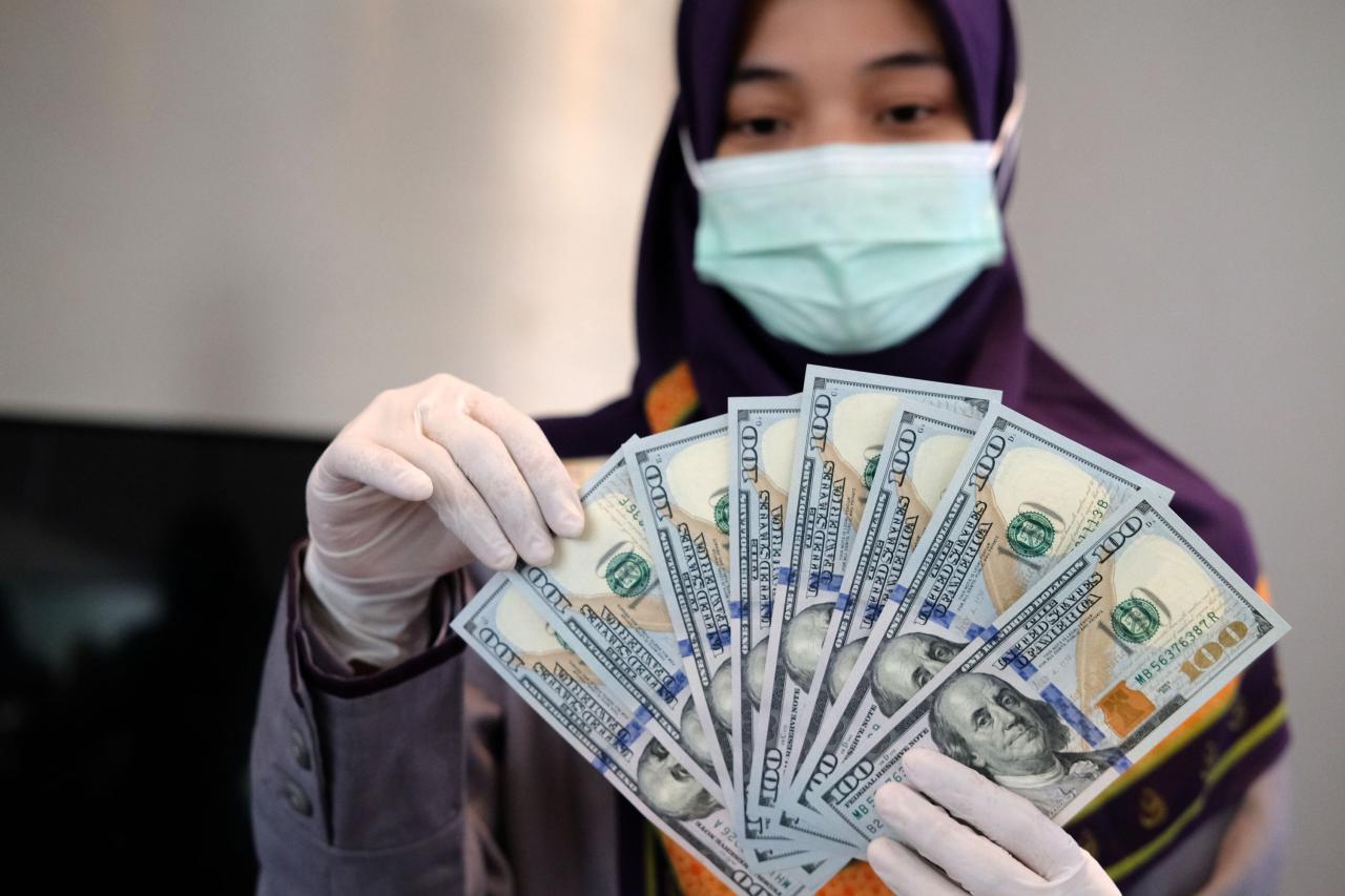 Penurunan Suku Bunga...