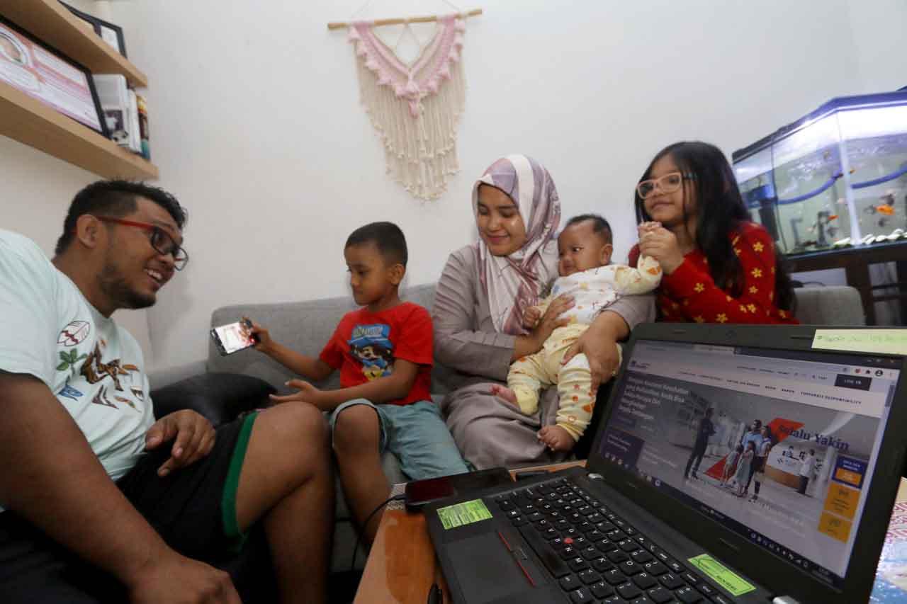 Komitmen AXA Mandiri...